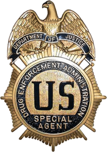 640px-DEA_badge_C